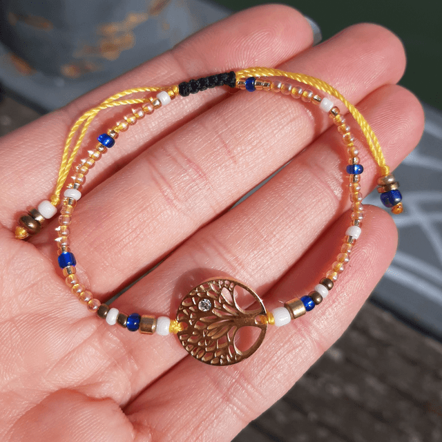 Superbe Bracelet Femme Arbre de Vie Doré en acier inoxydable orné d'une mini pierre Swarovski, sur nœud coulissant  