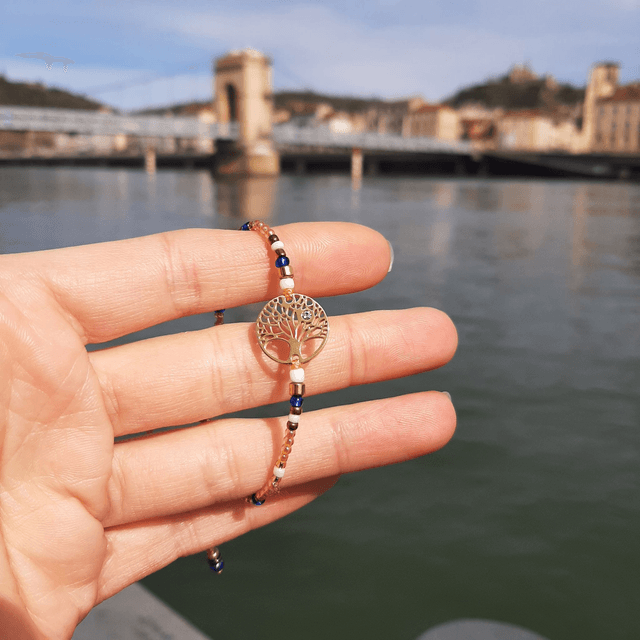 Superbe Bracelet Femme Arbre de Vie Doré en acier inoxydable orné d'une mini pierre Swarovski, sur nœud coulissant  