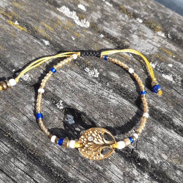 Superbe Bracelet Femme Arbre de Vie Doré en acier inoxydable orné d'une mini pierre Swarovski, sur nœud coulissant  